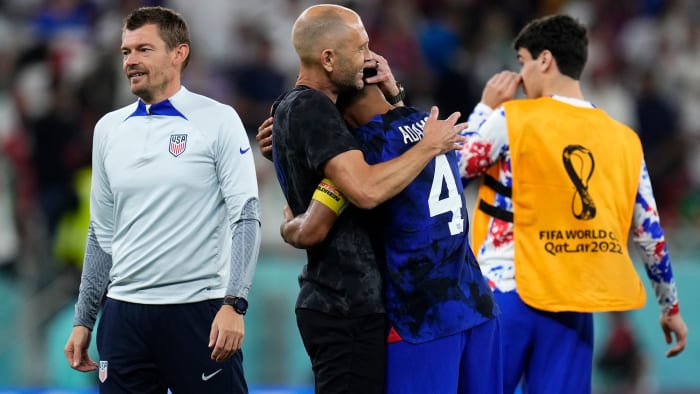 Gregg Berhalter and Tyler Adams after the USMNT beat Iran